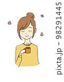 コーヒーでリラックスする女性 98291445