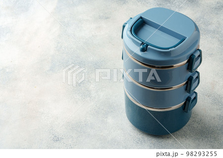 New plastic lunch box on a gray background New plastic lunch box on a gray background 98293255