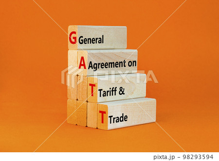 GATT symbol. Concept words GATT general agreement on tariff and trade on wooden block on beautiful orange background. Business GATT general agreement on tariff and trade concept. Copy space. 98293594
