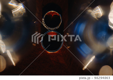 Designer wedding rings lying on the surface. Two wedding rings 98294863