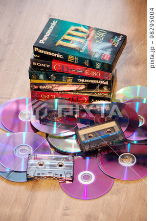 CDs, cassettes, microphone, video tapes. Attributes of the 1990s CDs, cassettes, microphone, video tapes. Attributes of the 1990s 98295004