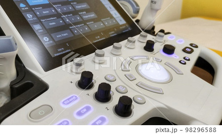 Various transducers on the sonography machine. Close up. System control panel of modern ultrasound equipment at backdrop in blur Various transducers on the sonography machine. Close up. System control panel of modern ultrasound equipment at backdrop in blur 98296588