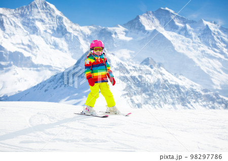 Ski and snow fun. Child in winter mountains. Ski and snow fun. Child in winter mountains. 98297786