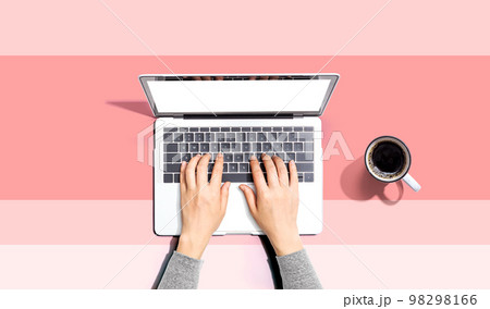 Person using a laptop computer 98298166