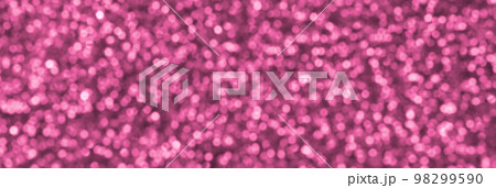 Blurred coral red decorative sequins. Background image with shiny bokeh lights from small elements Blurred coral red decorative sequins. Background image with shiny bokeh lights from small elements 98299590