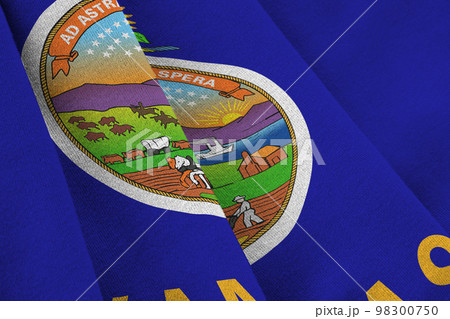 Kansas US state flag with big folds waving close up under the studio light indoors. The official symbols and colors in banner 98300750