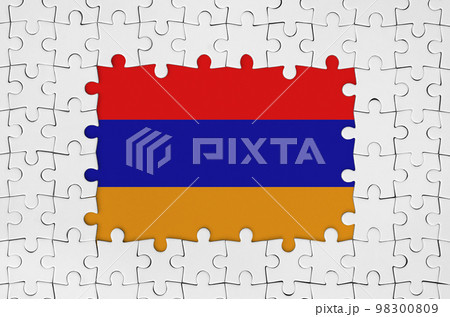 Armenia flag in frame of white puzzle pieces with missing central part 98300809