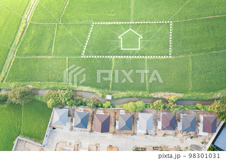 Land and house in aerial view. Land and house in aerial view. 98301031