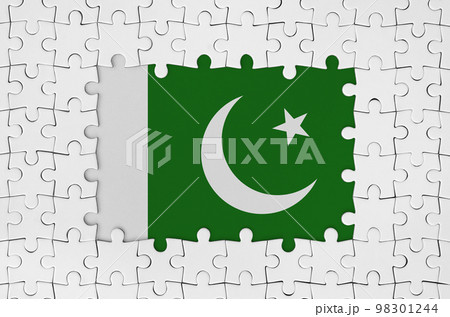 Pakistan flag in frame of white puzzle pieces with missing central part 98301244