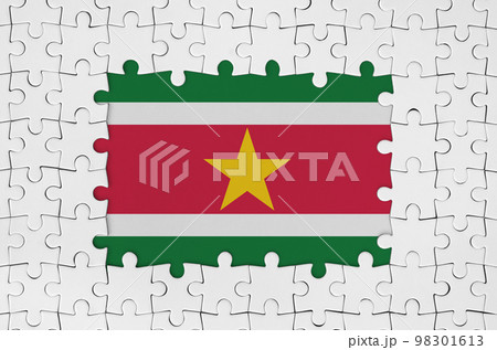 Suriname flag in frame of white puzzle pieces with missing central part Suriname flag in frame of white puzzle pieces with missing central part 98301613