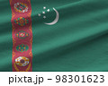 Turkmenistan flag with big folds waving close up under the studio light indoors. The official symbols and colors in banner 98301623