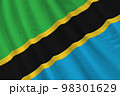 Tanzania flag with big folds waving close up under the studio light indoors. The official symbols and colors in banner 98301629