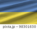 Ukraine flag with big folds waving close up under the studio light indoors. The official symbols and colors in banner 98301630