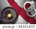 Alabama US state flag with judge mallet and handcuffs in dark room. Concept of criminal and punishment 98301635