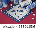 Arkansas US state flag and few used aerosol spray cans for graffiti painting. Street art culture concept 98301636