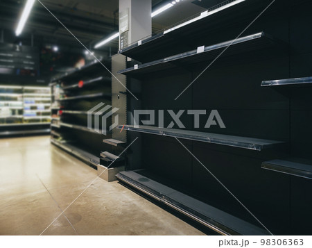 Supermarket with empty shelves of product goods Emergency situation 98306363