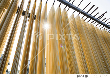 Close-up of traditional handmade noodle-making drying outdoors in Guanmiao, Tainan, Taiwan. 98307282