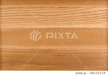 Brown Beige Texture of stained oak wood with grain, fragment of a wooden panel hardwood. surface bark is used as natural background, web page, board, table. Contrasts and symmetries. Space for text. 98310219
