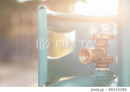 Metal valve for close or open on new green cooking gas tank. safety from gas using concept 98310380