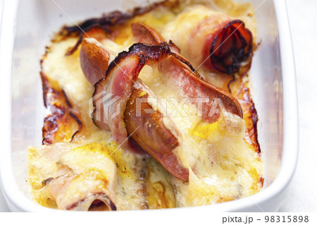 wurst in bacon baked with chedar cheese 98315898