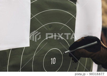 Soldier marking the target for shooting 98316877