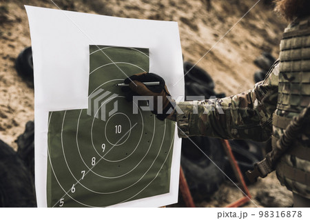 Soldier marking the target for shooting 98316878