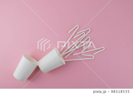 Cocktail straws Day. Drinking straws on a pink background. Summer cocktail party, a fun and happy holiday concept. place for your text 98318535