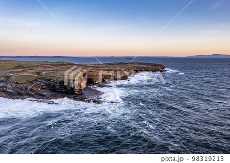 Muckross Head peninsula during sunset - about 10 km west of Killybegs village in county Donegal on the west coast of Ireland Muckross Head peninsula during sunset - about 10 km west of Killybegs village in county Donegal on the west coast of Ireland 98319213
