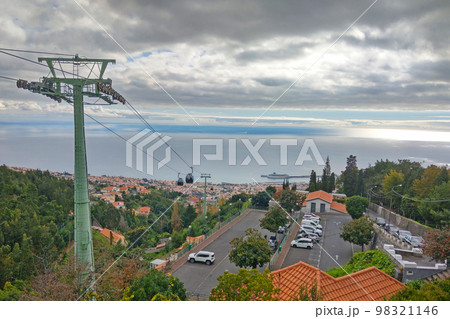 View from a height of the cable car and the city of Funchal, Madeira, Portugal. 98321146
