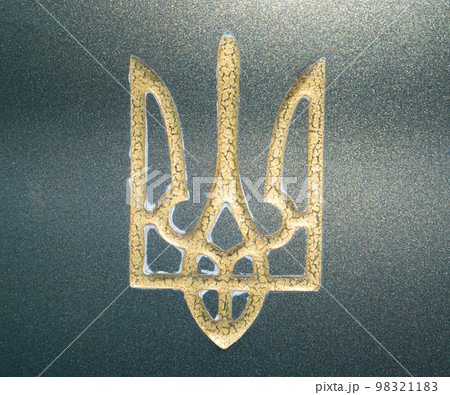 Golden coat of arms of Ukraine Trident on green marble. Golden coat of arms of Ukraine Trident on green marble. 98321183