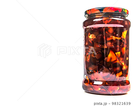 Canned fruits and vegetables in glass jars. 98321639