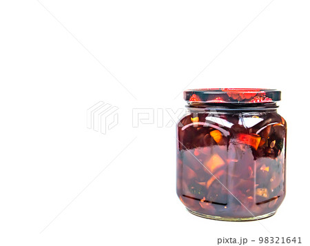Canned fruits and vegetables in glass jars. Canned fruits and vegetables in glass jars. 98321641
