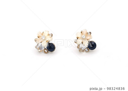 Flowers earrings, a pair of luxury earrings on white isolated background. Accessory earrings for women. Flowers earrings, a pair of luxury earrings on white isolated background. Accessory earrings for women. 98324836