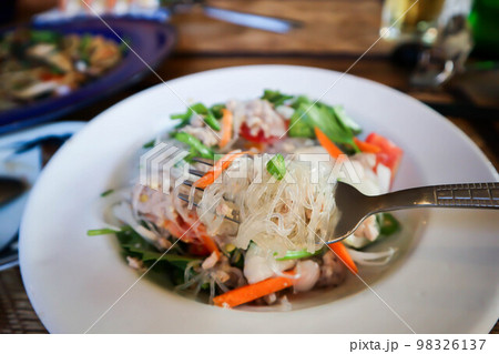spicy salad or noodles salad, Thai spicy salad or vermicelli and minced pork salad or vermicelli salad 98326137