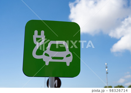 Green sign of car electric charging station. 98326714