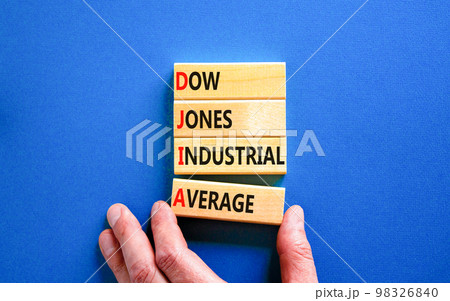 DJIA Dow Jones industrial average symbol. Concept words DJIA Dow Jones industrial average on wooden block on beautiful blue background. Business DJIA Dow Jones industrial average concept. Copy space DJIA Dow Jones industrial average symbol. Concept words DJIA Dow Jones industrial average on wooden block on beautiful blue background. Business DJIA Dow Jones industrial average concept. Copy space 98326840