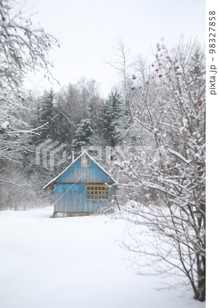 winter landscape panorama with wooden house in the forest. Snow covered hut. Christmas holiday and winter vacations concept winter landscape panorama with wooden house in the forest. Snow covered hut. Christmas holiday and winter vacations concept 98327858