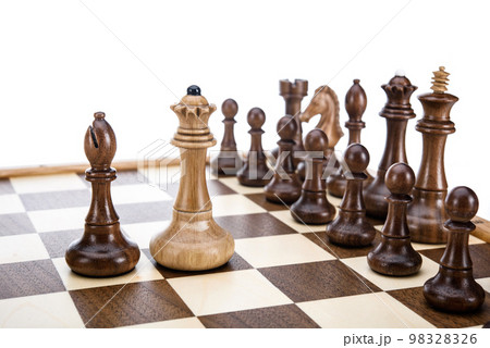 Beige Brown Wooden chess different pieces figures standing on chessboard. Close up game concept competition, Classic Gambit Tournament of confrontation. Beige Brown Wooden chess different pieces figures standing on chessboard. Close up game concept competition, Classic Gambit Tournament of confrontation. 98328326