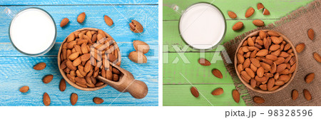 Almond milk in a glass and almonds in a bowl on green wooden background. Top view 98328596
