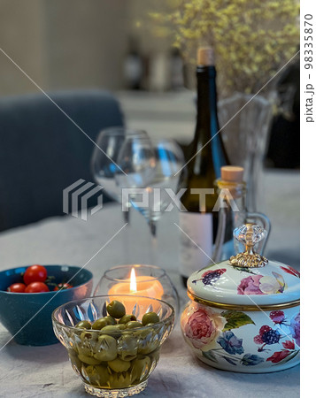 Wine on the table. Wine and olives on the table. 98335870