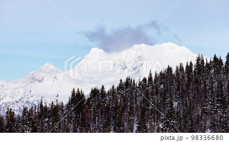 Snow and Cloud covered Canadian Nature Landscape Background. Winter Season in Whistler 98336680