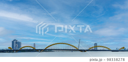 Dragon bridge with Han river in Da Nang city. Landmark and popular for tourist attraction. Vietnam and Southeast Asia travel concept 98338278