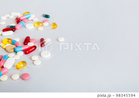 Many different colorful medication and pills perspective view. Set of many pills on colored background 98345594