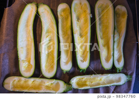 before baked zucchini with ham and vegetables, under cheese before baked zucchini with ham and vegetables, under cheese 98347760
