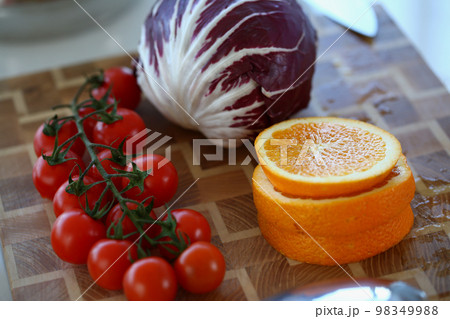 Set of vegetables and fruits on cutting board 98349988