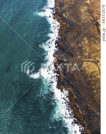Vertical view of rocky Iceland south shore  98351676