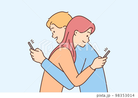 Couple hug using cellphone Couple hug using cellphone 98353014