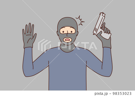 Male robber with gun raise hands up 98353023