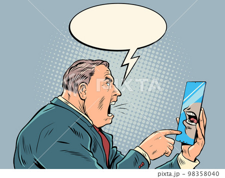 A businessman man shouts into a smartphone. Voice message, internet online chat A businessman man shouts into a smartphone. Voice message, internet online chat 98358040