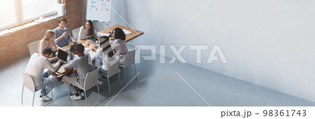 Wide Horizontal Banner With Multiethnic Business Team Discussing New Project In Office 98361743